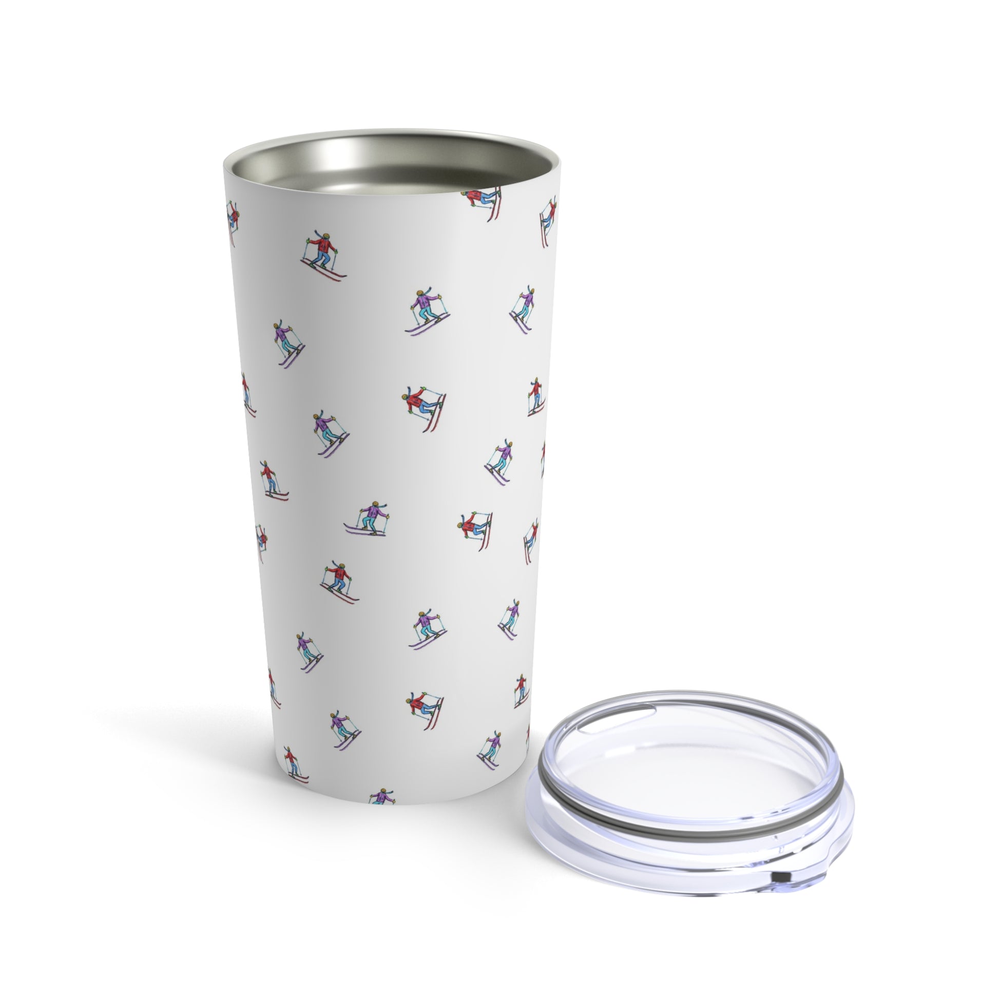 20oz tumbler with an illustrated skier pattern, titled 'Carving the Slopes,' shown with the lid off against a white background, ideal for winter sports lovers.