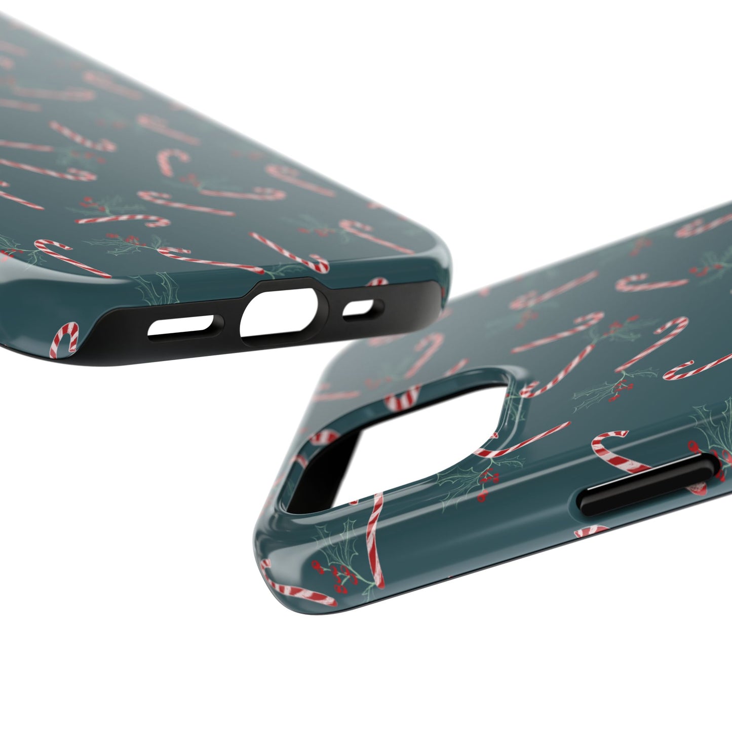 Close-up view of a Samsung and iPhone case with a candy cane and holly holiday pattern, shown at a floating angle to highlight the vibrant festive design and detailed craftsmanship.